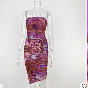 Abstract purple swirl dress.Never worn. Body mid calf length. zipper back.Size L